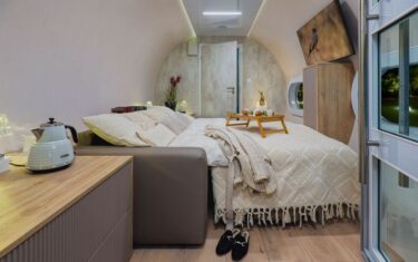 The interior of a normobaric chamber for private use, arranged as a comfortable living room